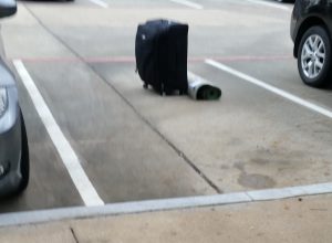 Luggage In Parking Lot Image
